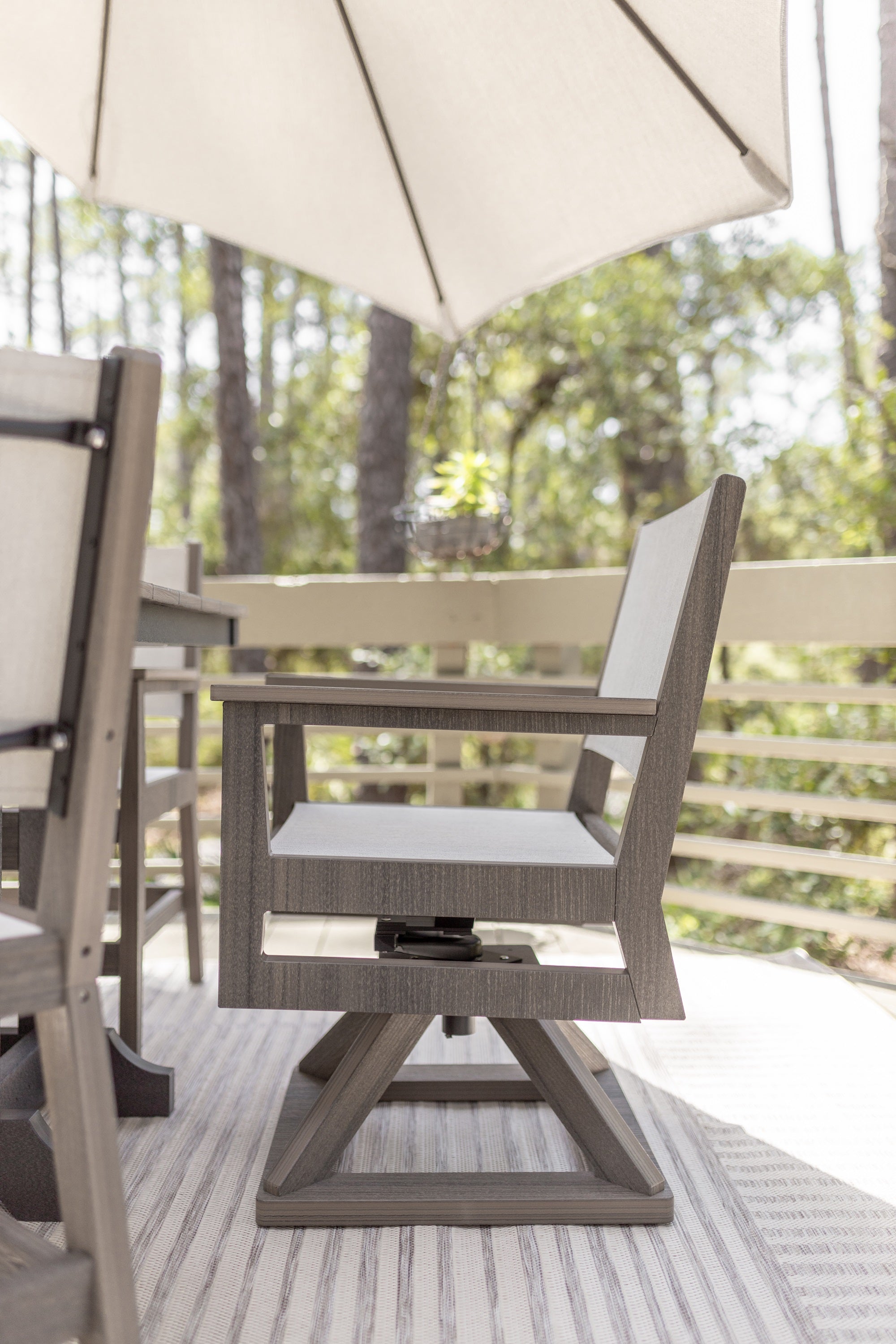 Mayhew Sling Swivel Rocker Dining Chair